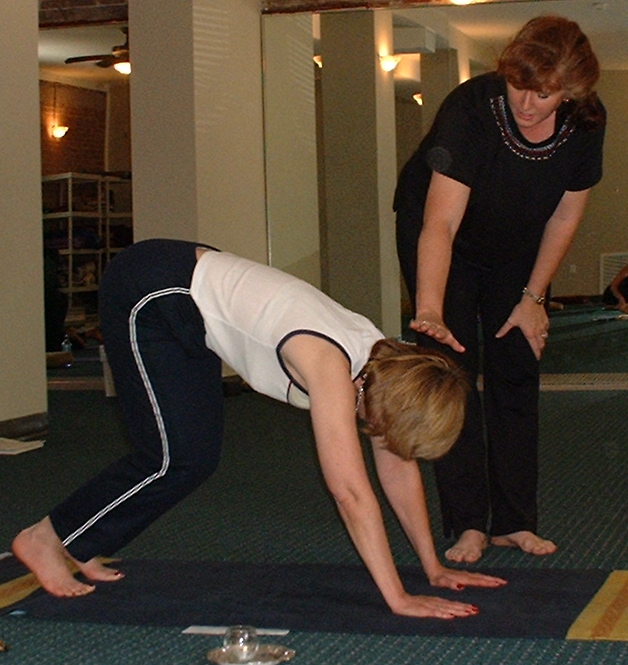 Carol teaches Downward Dog