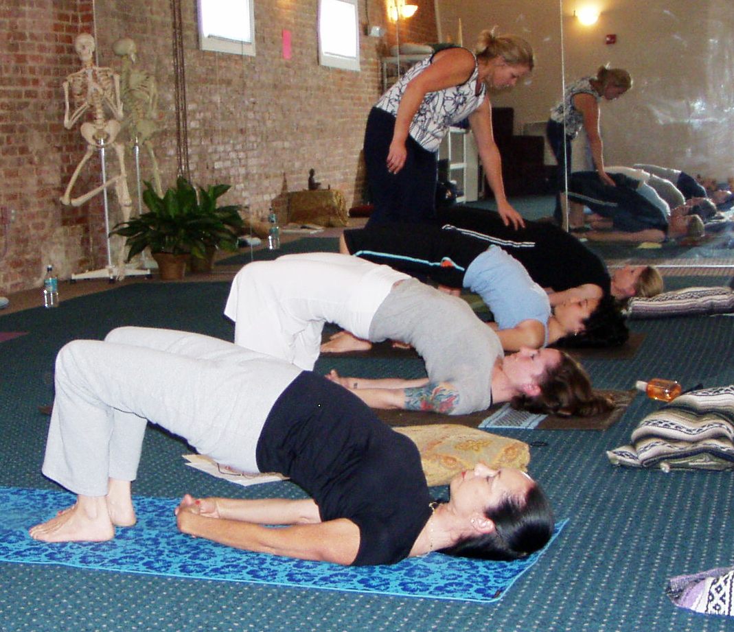 Moira guides Setu Bandhasana